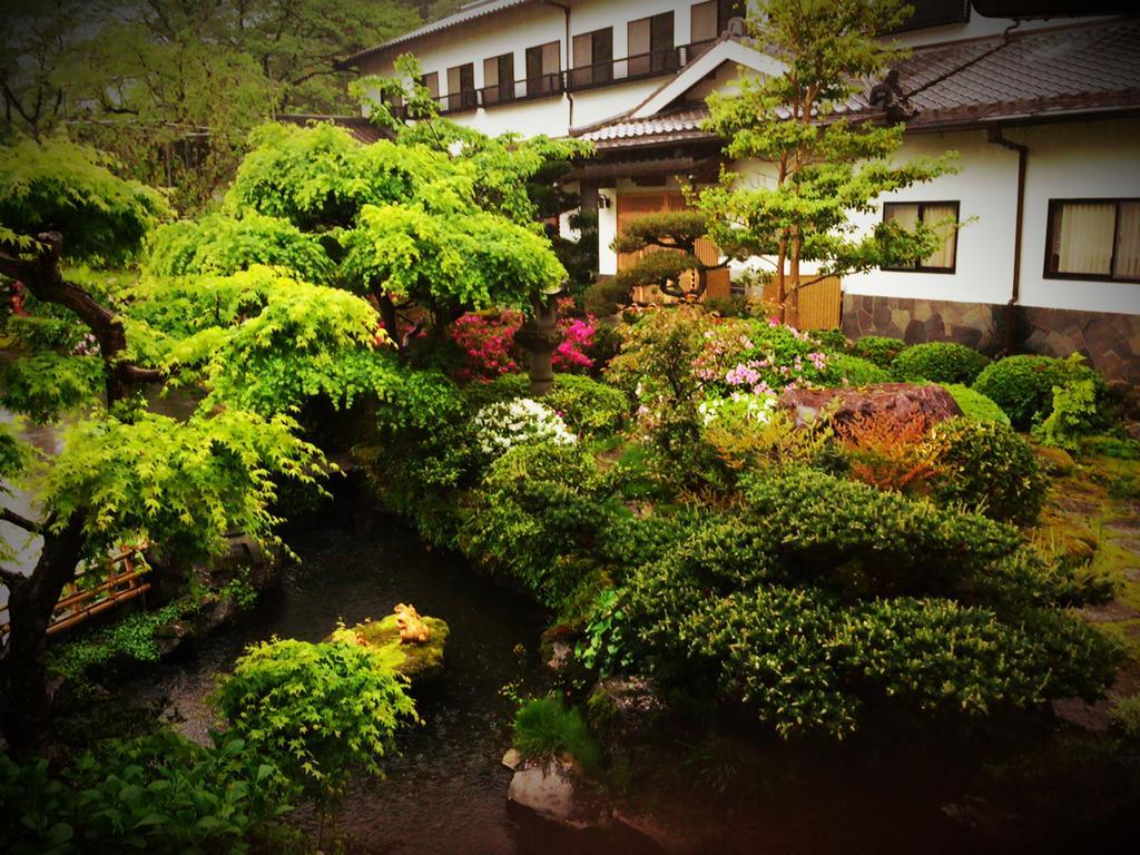 Отель Okumizuma Onsen Kaizuka Экстерьер фото