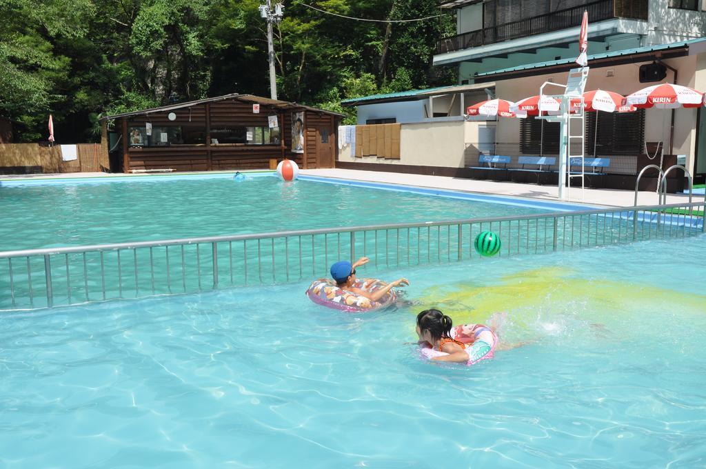 Отель Okumizuma Onsen Kaizuka Экстерьер фото